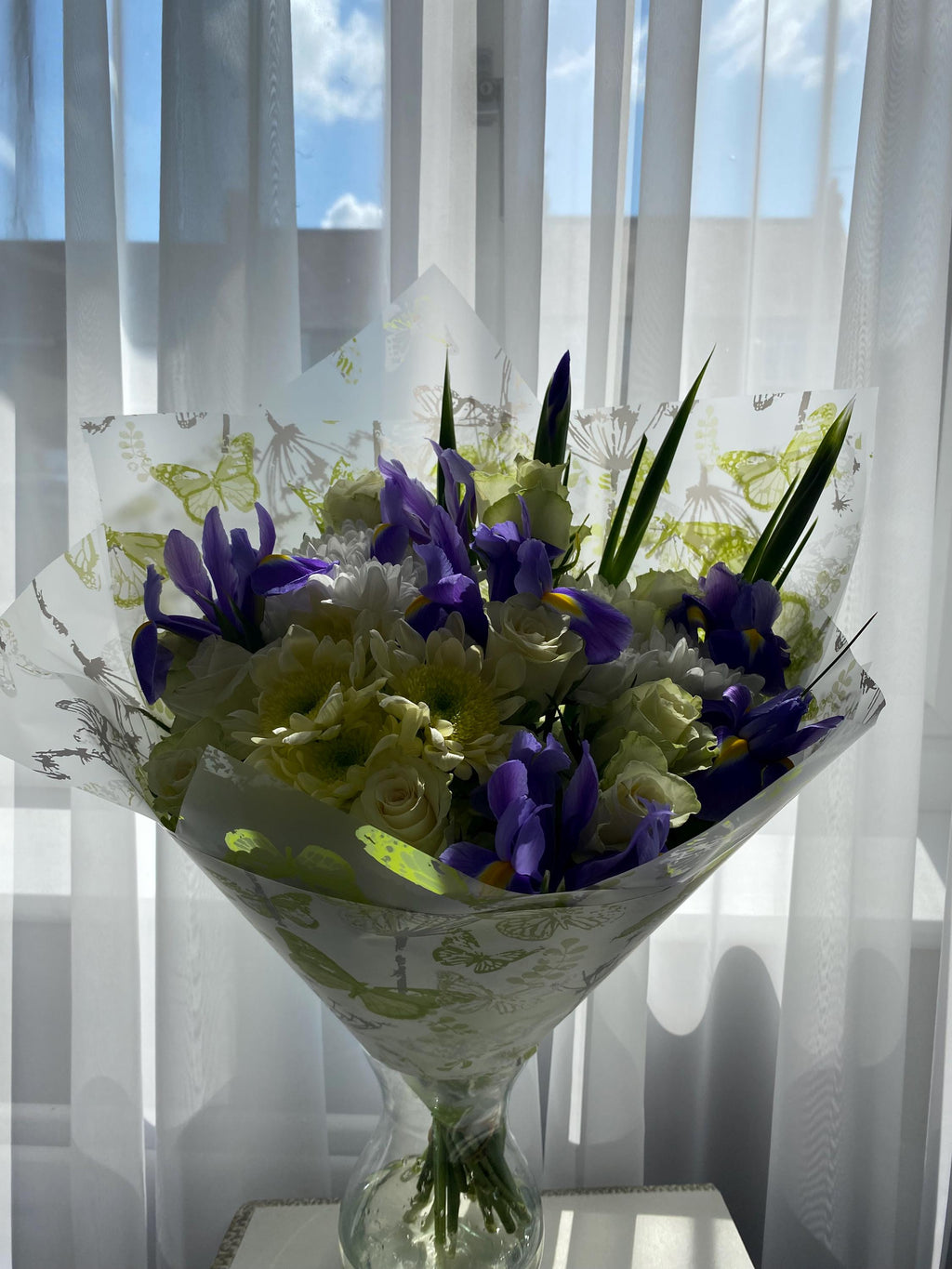 Fresh white roses blue iris arrangement next day delivery UK