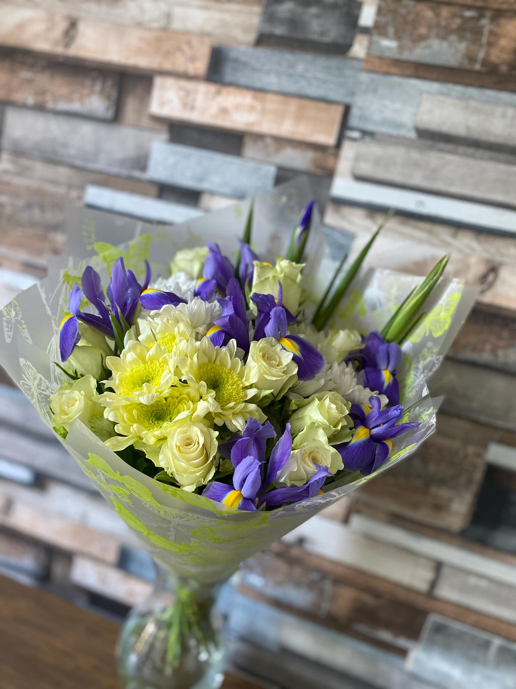 White roses blue iris bouquet close up premium quality flowers